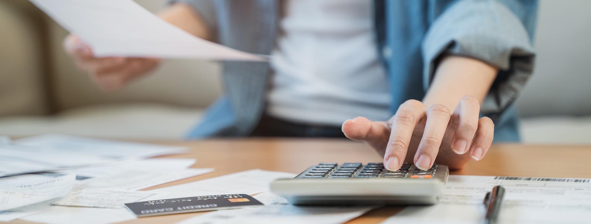 Woman calculating bills