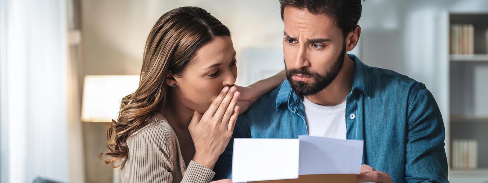 Man and woman reading an eviction notice